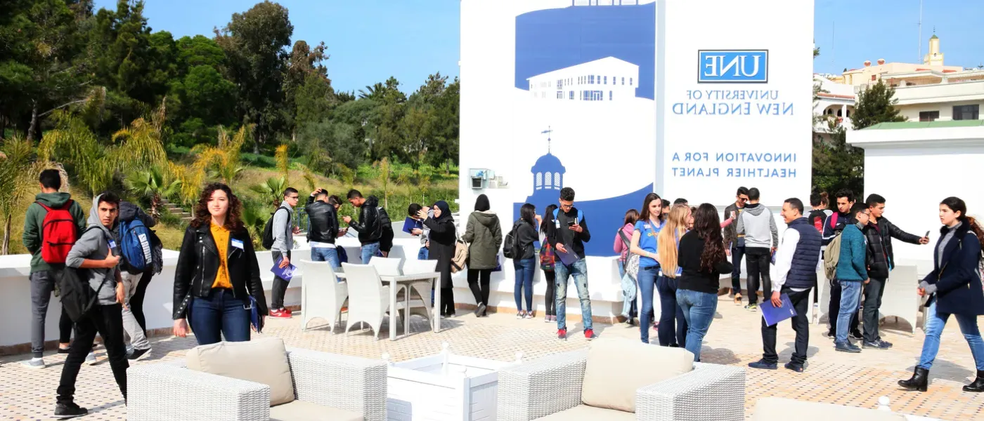 Moroccan students on UNE Morocco rooftop during tour